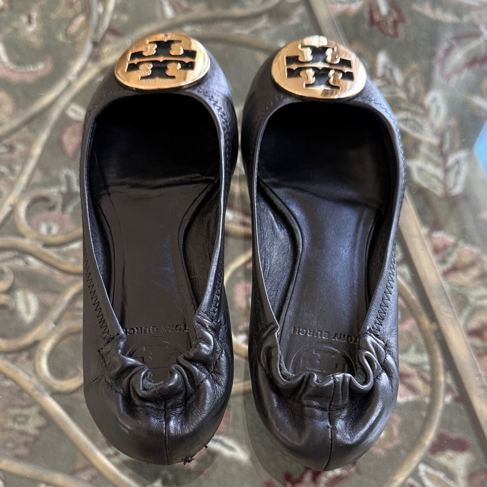 Tory Burch Gorgeous Black Flats with Gold Emblem - Picture 4 of 7